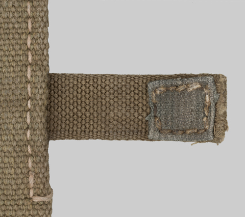 Images of German Afrika Korps bayonet belt frog.