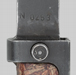 Thumbnail image of Czechoslovakia VZ-58 knife bayonet with composition grip secured by three rivets.